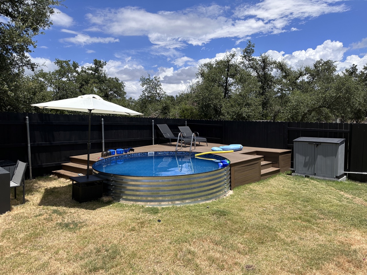 A semi-inground StainlessSwim pool